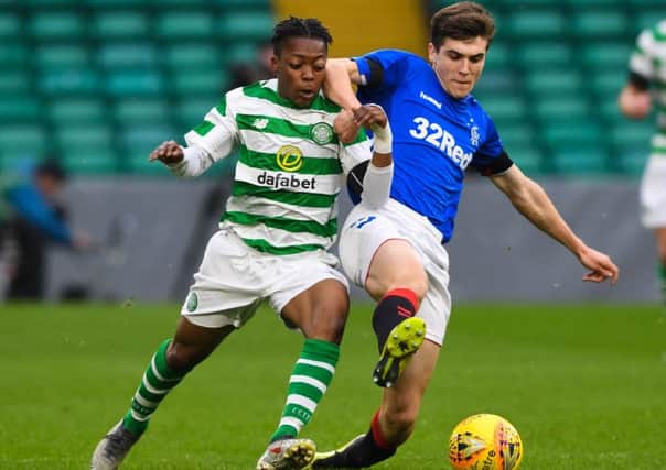 Celtic's Karamoko Dembele vies with Jamie Barjonas of Rangers in the City of Glasgow Cup final. Picture: Craig Foy/SNS