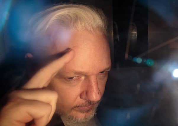Wikileaks Founder Julian Assange leaves Southwark Crown Court in a security van after being sentenced on May 1. Picture: Jack Taylor/Getty Images