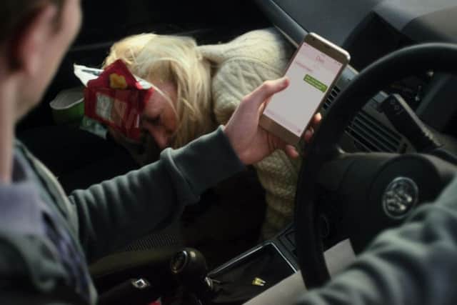 Gran appearing unexpectedly from under litter in the passenger footwell