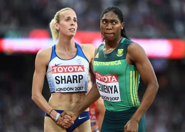 Caster Semenya, right, shakes hands with Lynsey Sharp at the 2017 World Championships in London. Picture: Jewel Samad/AFP/Getty Images
