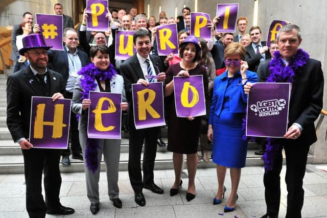 Scotland's party leaders dress in purple to celebrate LGBT rights in 2017. Pic: Lisa Ferguson.
