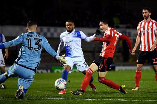 Lewis Morgan beats Bristol Rovers' 'keeper Jack Bonham to score his sides second goal during the Checkatrade Trophy semi final