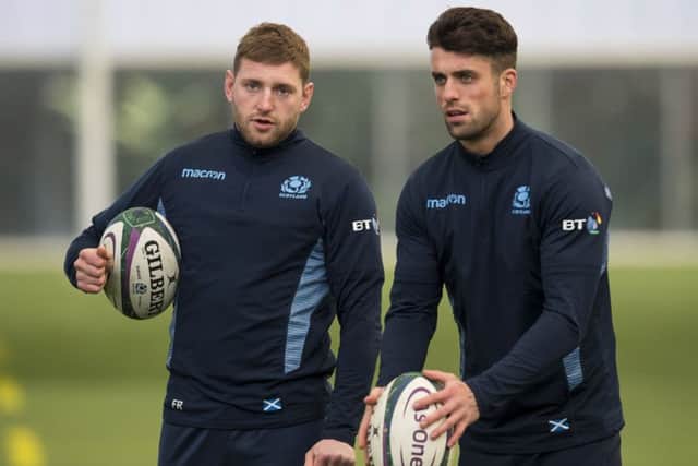Finn Russell, left, is still the go-to man for Scotland at stand-off, despite Adam Hastings' rise to prominence. Picture: Bruce White/SNS/SRU
