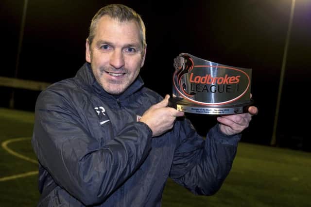 Montrose manager Stewart Petrie with his Ladbrokes League 1 Manager of the Month award for December. Picture: Alan Harvey/SNS