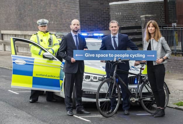 Inspector Andrew Thomson (Police Scotland), Cycling Scotland chief executive Keith Irving, Michael Matheson (Cabinet Secretary for Transport, Infrastructure and Connectivity) and Cycling Scotland head of communications Denise Hamilton at the launch of Cycling Scotland's annual cycling road safety campaign in Glasgow.

 Picture: Warren Media