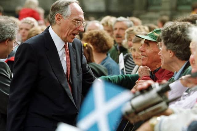 Donald Dewar speaks to people on the Royal Mile on the day the Scottish Parliament opened in 1999 (Picture: Neil Hanna)