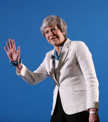 Theresa May's support for Chinese 5G work has alarmed US Senator Chris Coons.