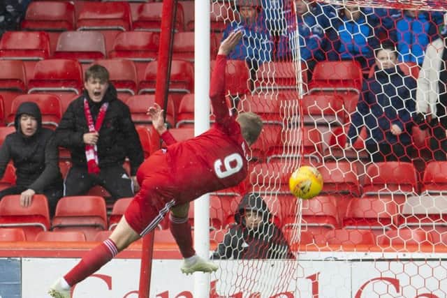 Aberdeen's James Wilson has a first half chance which clips the bar. Pic: SNS/Craig Foy