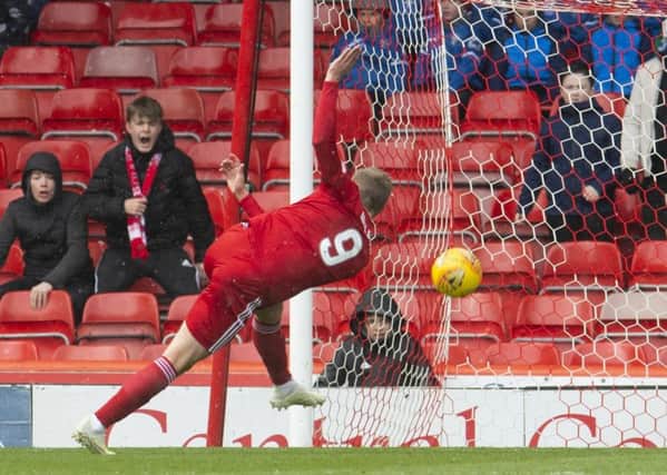 Aberdeen's James Wilson has a first half chance which clips the bar. Pic: SNS/Craig Foy