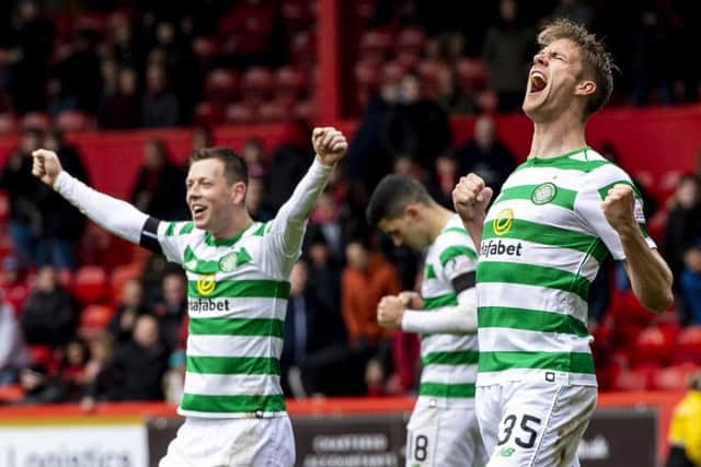04/05/19 LADBROKES PREMIERSHIP
ABERDEEN v CELTIC
PITTODRIE - ABERDEEN
Celtic's Kristoffer Ajer and Callum McGregor (left) celebrate at full time