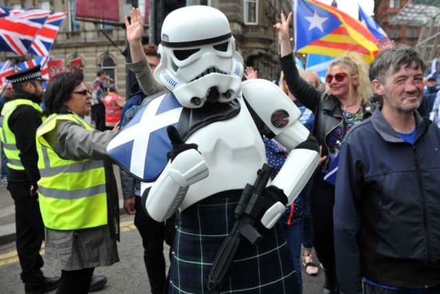 One marcher dressed as a Stormtrooper from the Star Wars on May the 4th