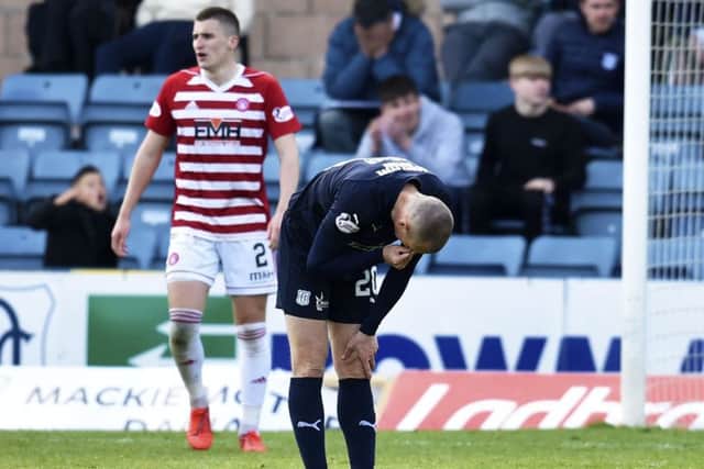 Dundee's Kenny Miller looks dejected as Dundee are relegated. Pic: SNS/Rob Casey