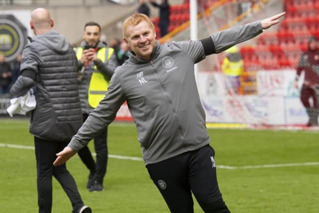 Celtic manager Neil Lennon celebrates winning the league. Pic: SNS/Craig Foy