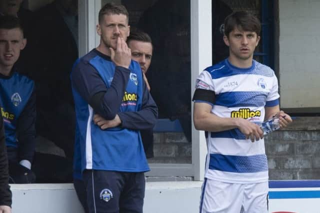 Morton's Jim McAlister (left) takes the team for the match while Charlie Telfer (right) comes on as a substitute. Pic: SNS