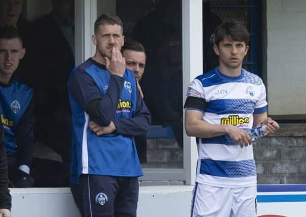 Morton's Jim McAlister (left) takes the team for the match while Charlie Telfer (right) comes on as a substitute. Pic: SNS