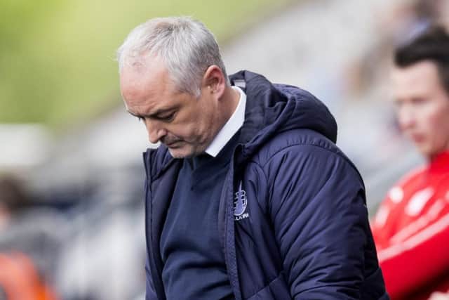Falkirk manager Ray McKinnon looks dejected at full-time. Pic: SNS/Bruce White