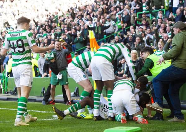 Odsonne Edouard celebrates with teammates during the 2-1 win over Rangesr in March. Pic: SNS
