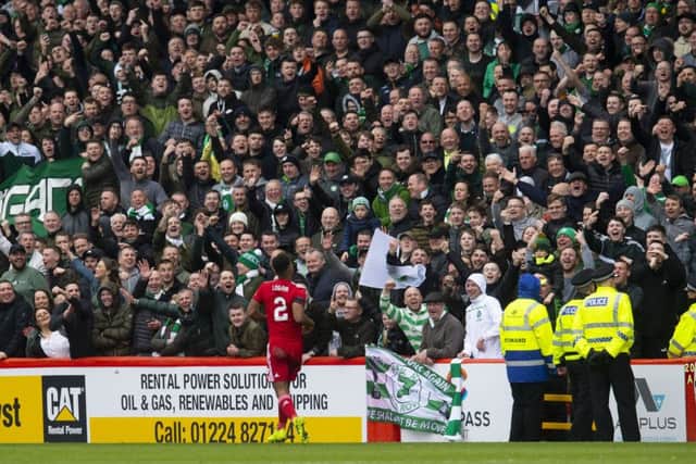 Celtic fans in the away end at Aberdeen. Picture: SNS