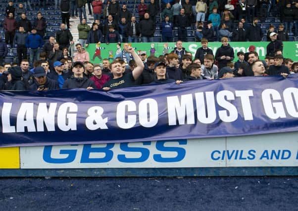 Falkirk fans direct their ire towards club chairman Margaret Lang and her board of directors. Picture: SNS.