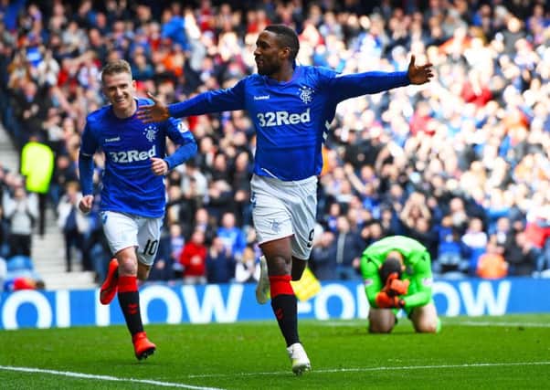 Jermain Defoe celebrates after scoring to give Rangers a 1-0 lead over Hibernian. Picture: SNS.
