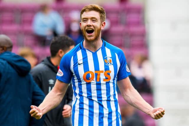 Kilmarnocks goal hero Stuart Findlay celebrates the win against Hearts. Picture: SNS.