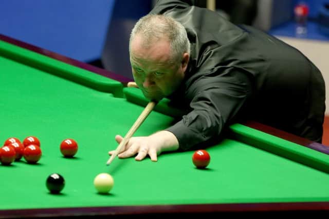 John Higgins will need all his experience to close gap on Judd Trump. Picture: Getty