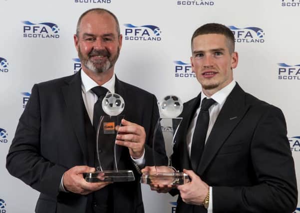 Manager of the Year Steve Clarke and Young Player of the Year Ryan Kent collect their awards at the PFA Scotland ceremony. Picture: Jeff Holmes/PA