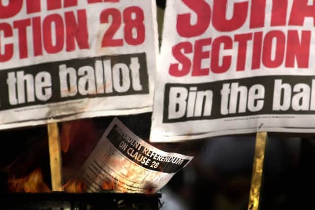 Ballot forms being symbolically burned in 2000 ahead of a publicly funded referendum on Section 28. Picture: PA