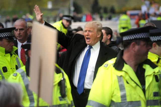 Donald Trump attended an inquiry into the Scottish Government's renewable energy targets in 2012