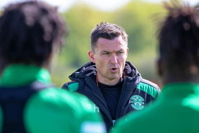 Paul Heckingbottom speaks to his players at Hibs' East Mains training centre. Picture: SNS Group