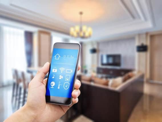 Many smart devices are connected through your phone, allowing you to have full access of your technology even when you're out and about (Photo: Shutterstock)