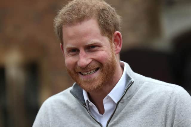 Harry told reporters Meghan had given birth to "a very healthy boy".