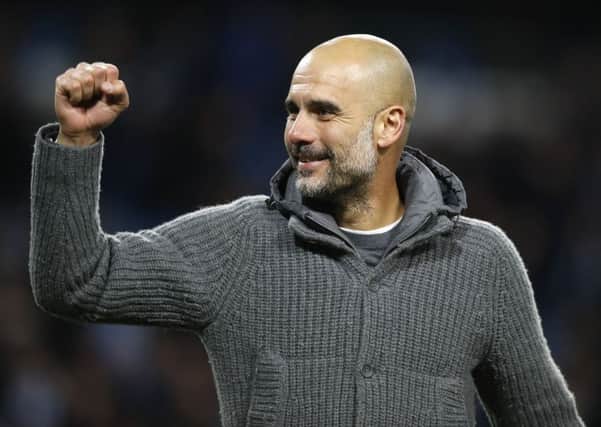 Pep Guardiola described this season as his most challenging, Picture: PA.