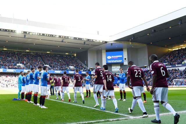 Rangers giving Hearts a guard of honour in 2015. Picture: SNS