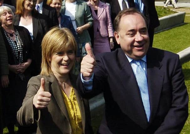 Then SNP deputy leader Nicola Sturgeon and party leader Alex Salmond celebrate their 2007 breakthrough election victory, which saw the Nationalists take power in Holyrood for the first time. Picture: Phil Wilkinson/TSPL