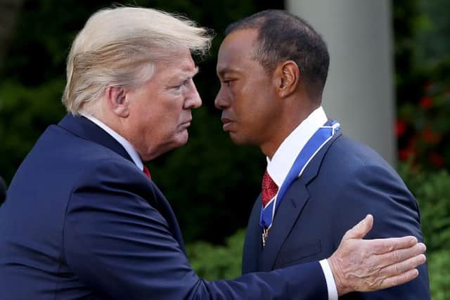 President Donald Trump presents Tiger Woods with the Medal of Freedom during a ceremony in the Rose Garden at the White House. Picture: Win McNamee/Getty Images