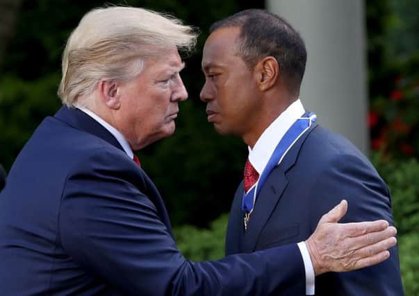 President Donald Trump presents Tiger Woods with the Medal of Freedom during a ceremony in the Rose Garden at the White House. Picture: Win McNamee/Getty Images