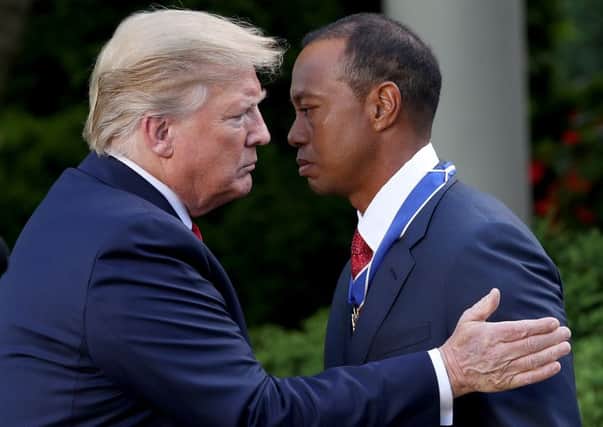 President Donald Trump presents Tiger Woods with the Medal of Freedom during a ceremony in the Rose Garden at the White House.  Picture: Win McNamee/Getty Images