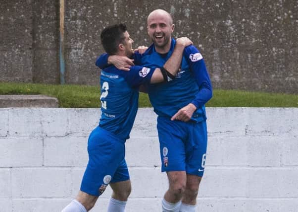 Montrose's Ross Campbell celebrates his opening goal against Queen of the South. Picture: SNS