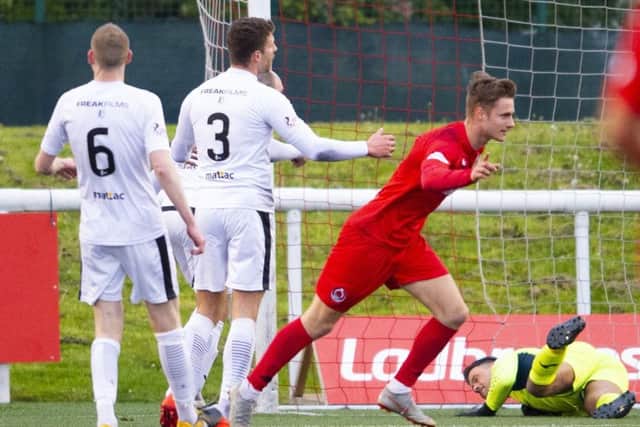 Clyde's Kristoffer Syvertsen wheels away to celebrate his goal against Edinburgh City. Picture: SNS