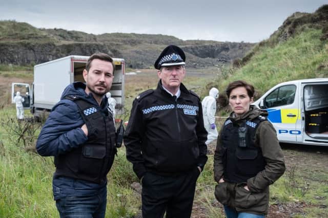 Line of Duty stars Martin Compston, Adrian Dunbar and Vicky McClure (C) World Productions - Photographer: Peter Marley