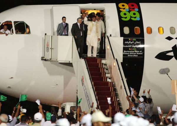 Abdelbaset al-Megrahi being greeted on his arrival in Tripoli on 20 August, 2009 after his release. Picture: AFP