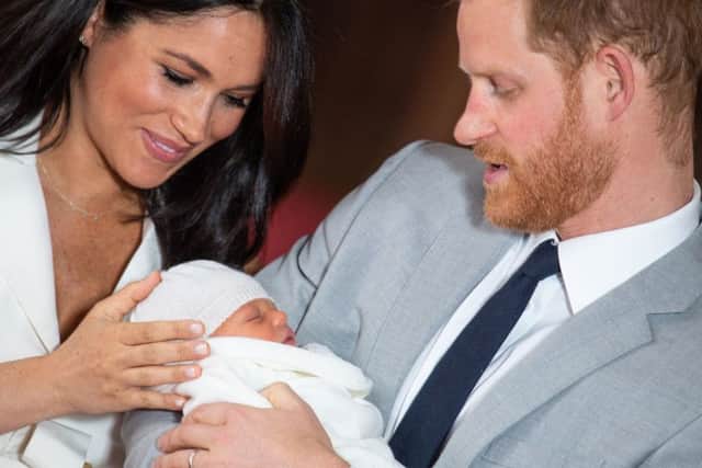 The Duke and Duchess of Sussex with their baby son, who was born on Monday morning. Picture: Dominic Lipinski/PA Wire