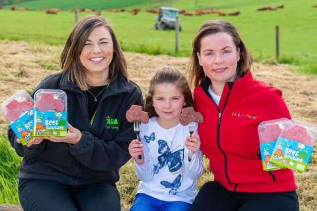Asdas Heather Turnbull (left) with Carlyn Paton and her eight-year-old daughter Daniella. Picture: Ian Georgeson