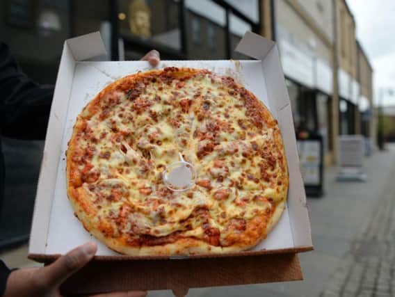The aardvark pizza also features green chillies, chicken and lamb mince (Photo: SWNS)