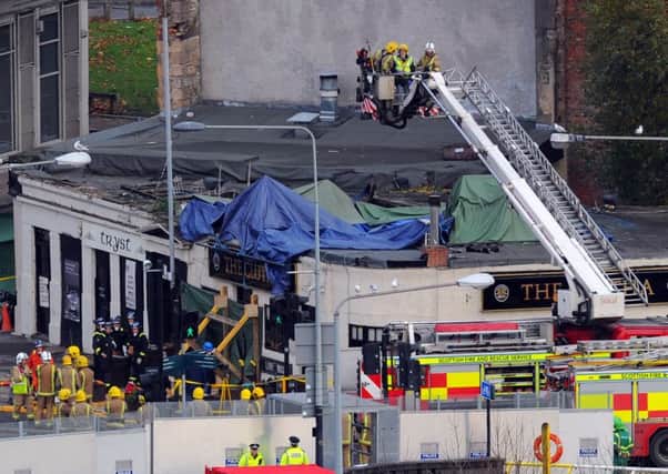 Ten people were killed when the Eurocopter EC135 helicopter crashed into the Clutha Bar in Glasgow. Picture: Robert Perry