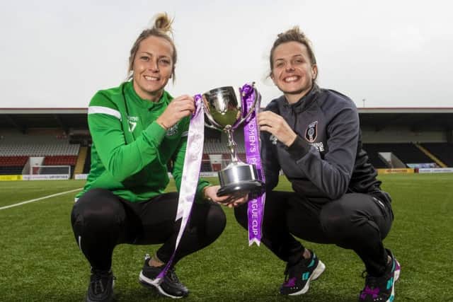 Hibernian's Joelle Murray, left, and Glasgow City's Hayley Lauder with the SWPL Cup. Picture: SNS