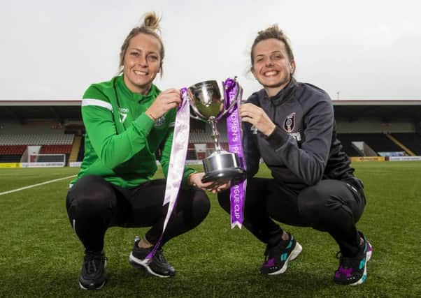 Hibernian's Joelle Murray, left, and Glasgow City's Hayley Lauder with the SWPL Cup. Picture: SNS