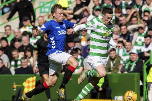 Callum McGregor vies with Scott Arfield during Celtic's win over Rangers in the last Old Firm derby in March. Picture: Alan Harvey/SNS