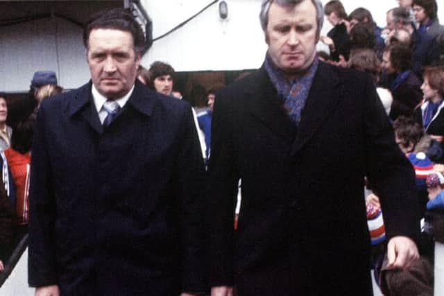 Celtic boss Jock Stein, left, and Rangers manager Jock Wallace walk out together.